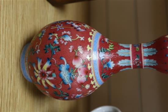 A pair of Chinese garlic neck vases and a famille rose teapot